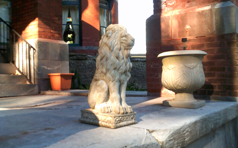 A lion statue outside of the notoriously haunted Wilson Castle in Proctor, Vermont.