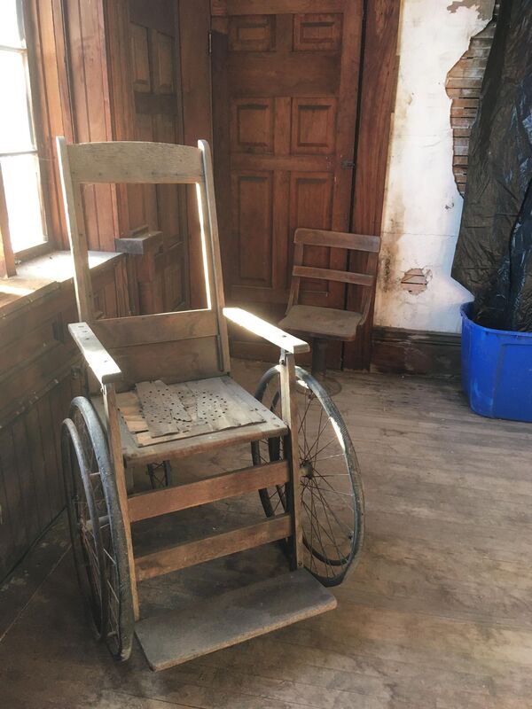 An old 1800's wheelchair on the 3rd Floor of the notoriously haunted Wilson Castle in Proctor, Vermont.